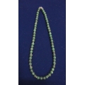 Necklace Of green Zade with silver rings